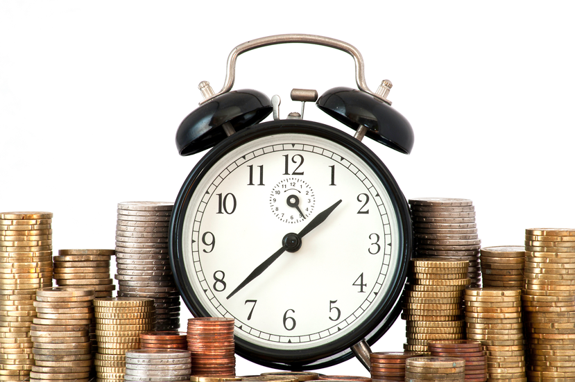 time is money concept alarm clock and lots of euro coins GyVhOjCO